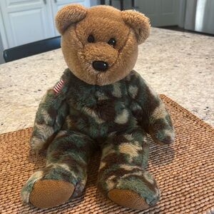 TY Hero Teddy Bear w/camouflage and American flag on upper arm. 8.5 inches tall.